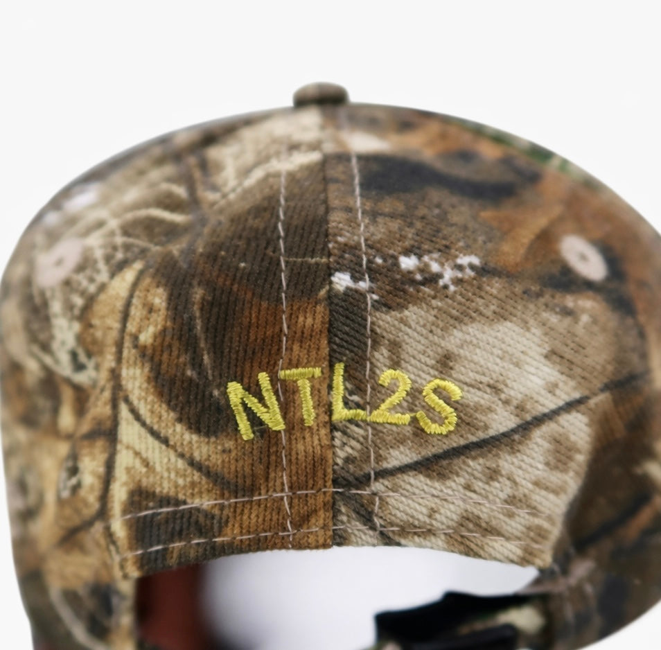First Gen Cowgirl Bleeding Cowboy Camo Cap - Yellow on Realtree