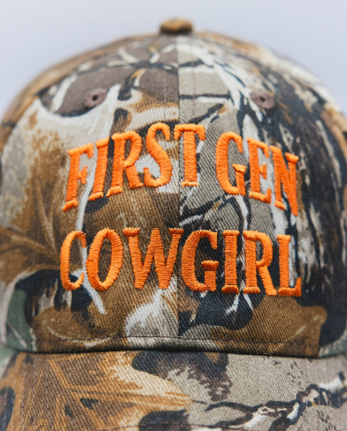 First Gen Cowgirl Camo Cap - Standard Logo in Orange on Classic Camo